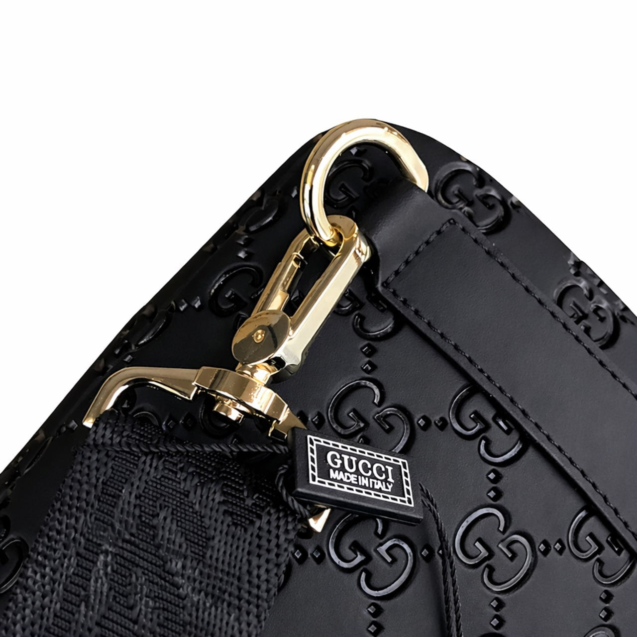 GG Embossed Leather Sling Bag