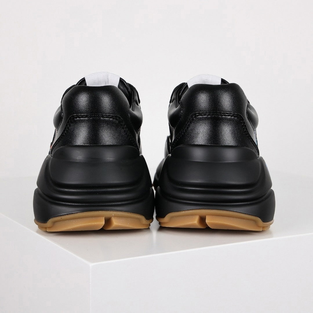 Rhyton Rainbow Logo Leather Sneaker | Black