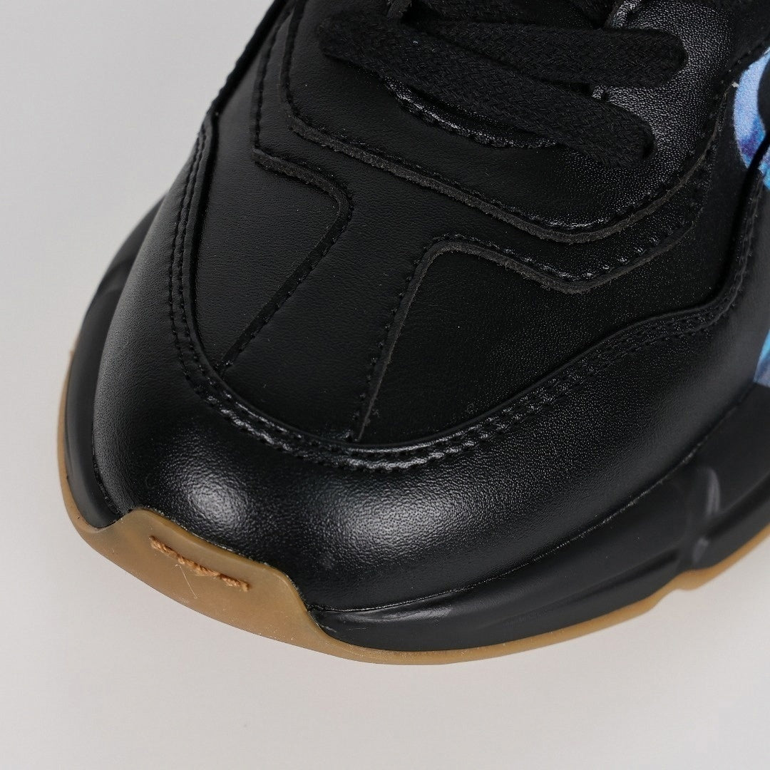 Rhyton Rainbow Logo Leather Sneaker | Black