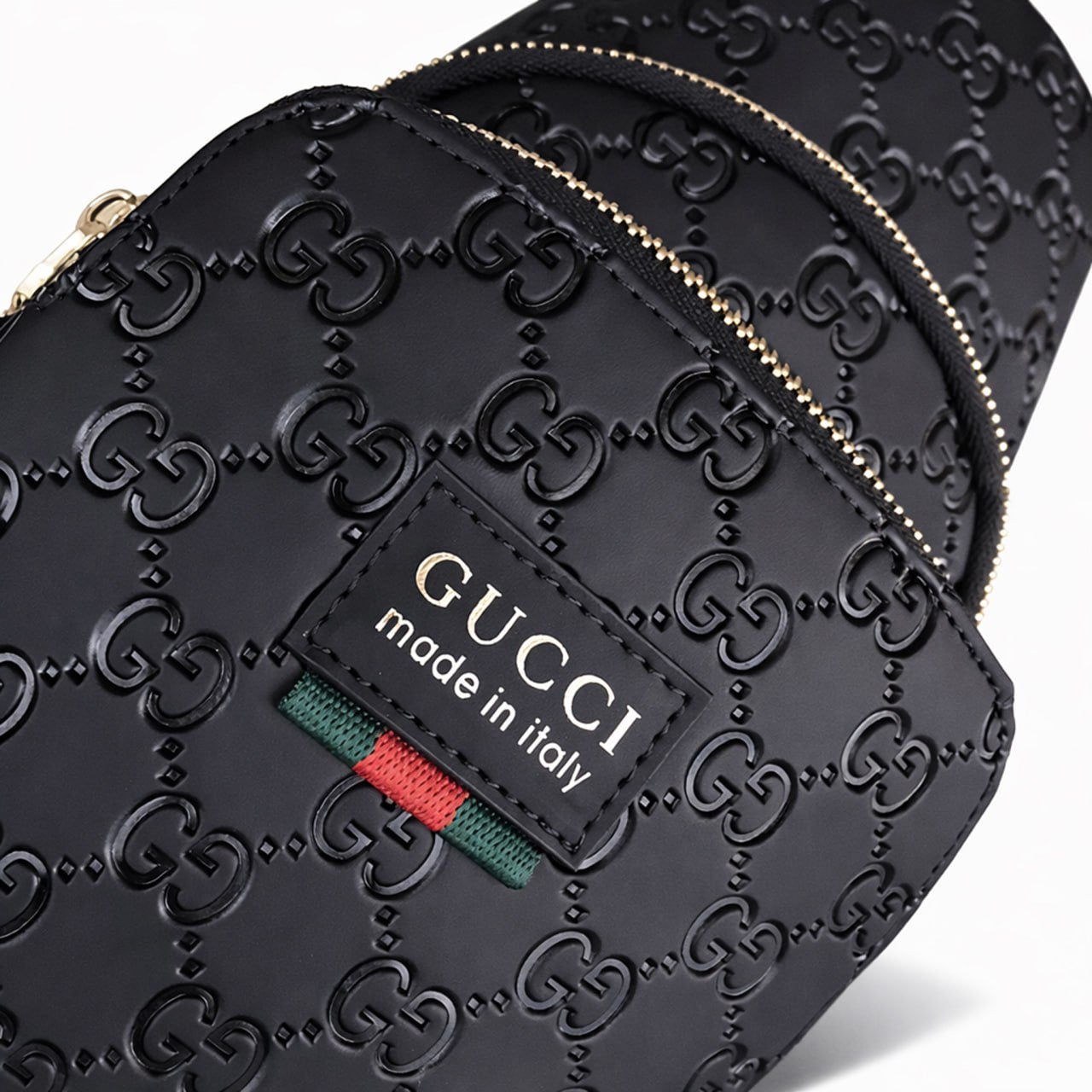 GG Embossed Leather Sling Bag